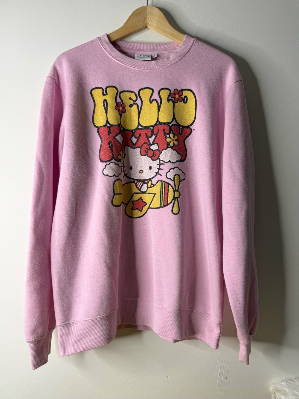 Hello Kitty Pink Graphic Crewneck Sweatshirt with Yellow & Red Print